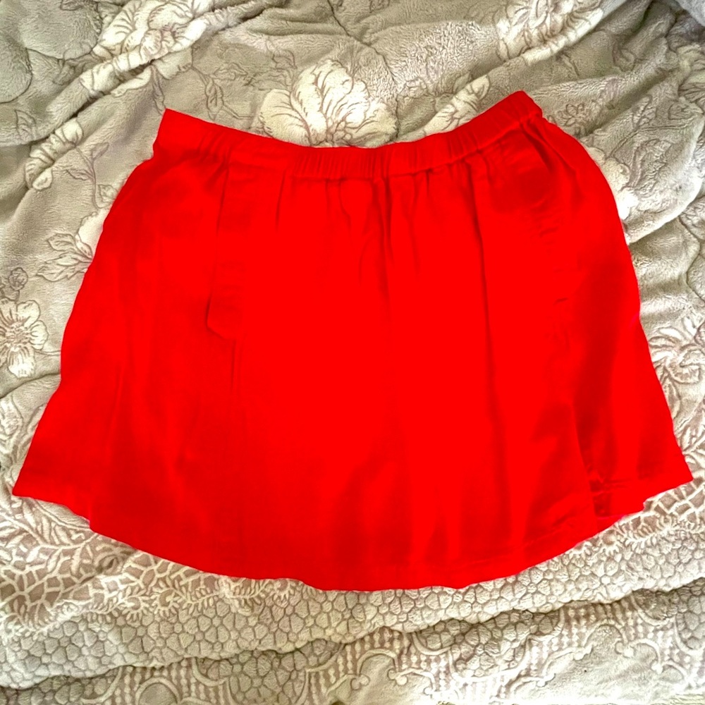 Red tennis skirt